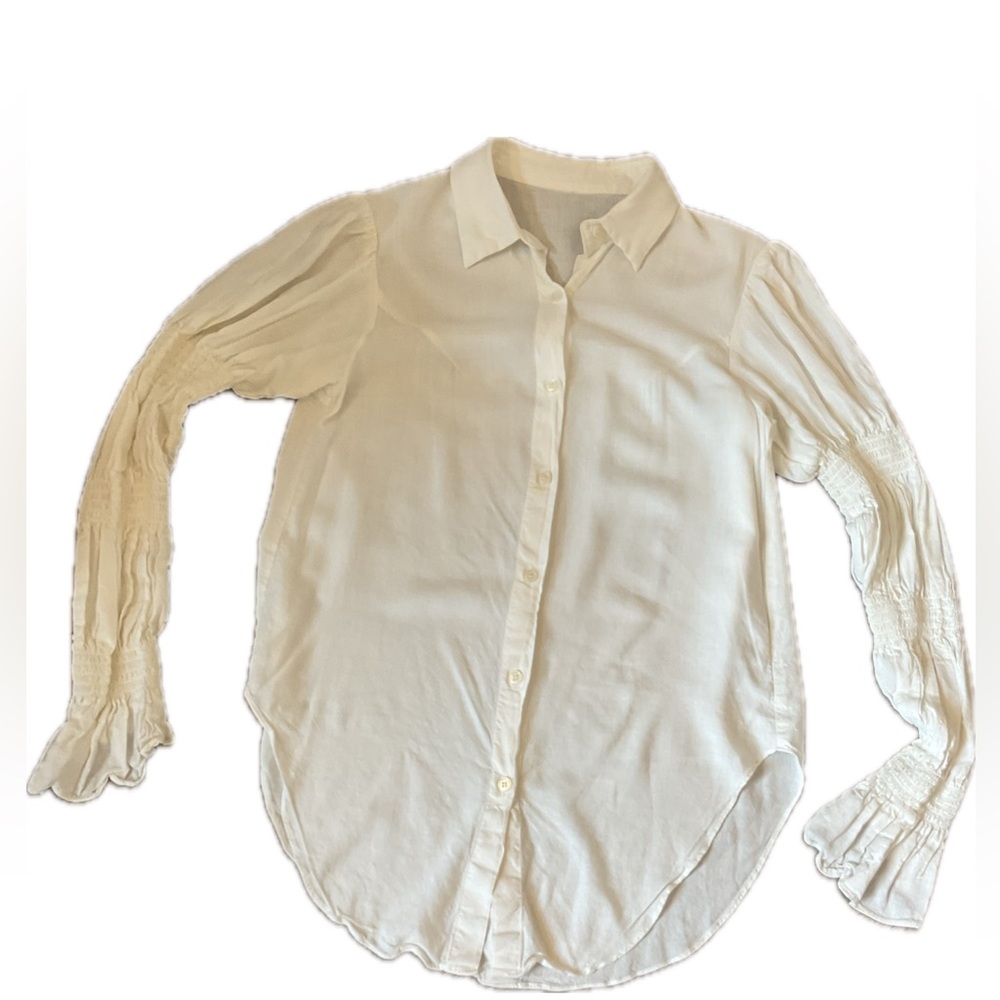 Chic Off White Button-Down Shirt with Statement Sleeves .